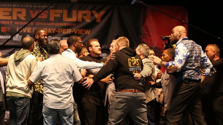 Tyson Fury and Deontay Wilder clash at final news conference