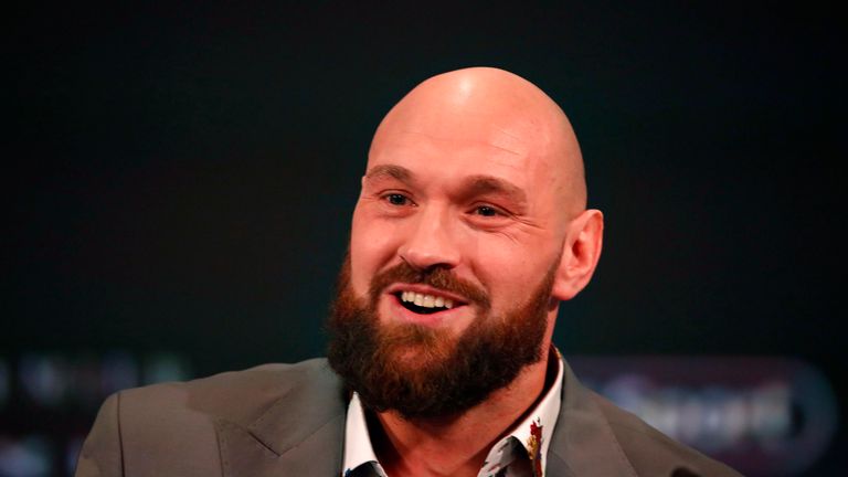 Tyson Fury attends a press conference ahead of his fight with Deontay Wilder in December
