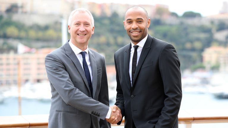 Monaco vice president Vadim Vasilyev and new head coach Thierry Henry pose as part of a press conference