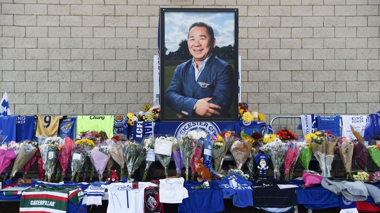 A portrait of Leicester City owner Vichai Srivaddhanaprabha is seen amongst floral tributes outside the King Power Stadium