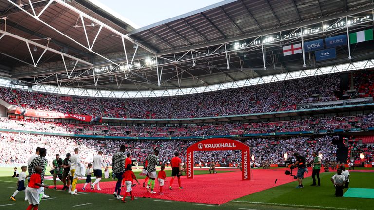 LONDON, ENGLAND - JUNE 02: England and Nigeria make their way onto the pitch before the International Friendly match between England and Nigeria at Wembley Stadium on June 2, 2018 in London, England. (Photo by Catherine Ivill/Getty Images)