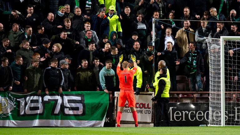 Hearts goalkeeper Zdnek Zlamal gestures to the Hibernian fans