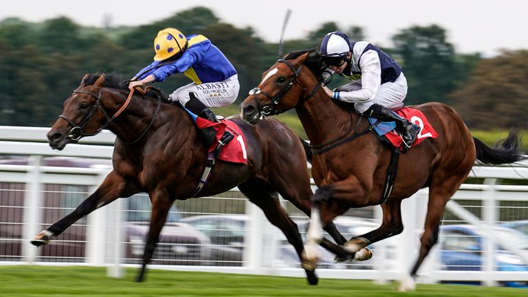 Almania strikes under Ryan Moore