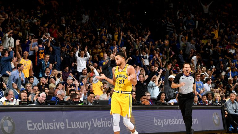 Stephen Curry reacts after making one of his 11 three-pointers as the Warriors thrashed the Wizards