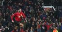 Fellaini late show sees Man Utd qualify