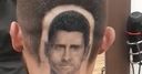 Fan shaves Djokovic's face into head