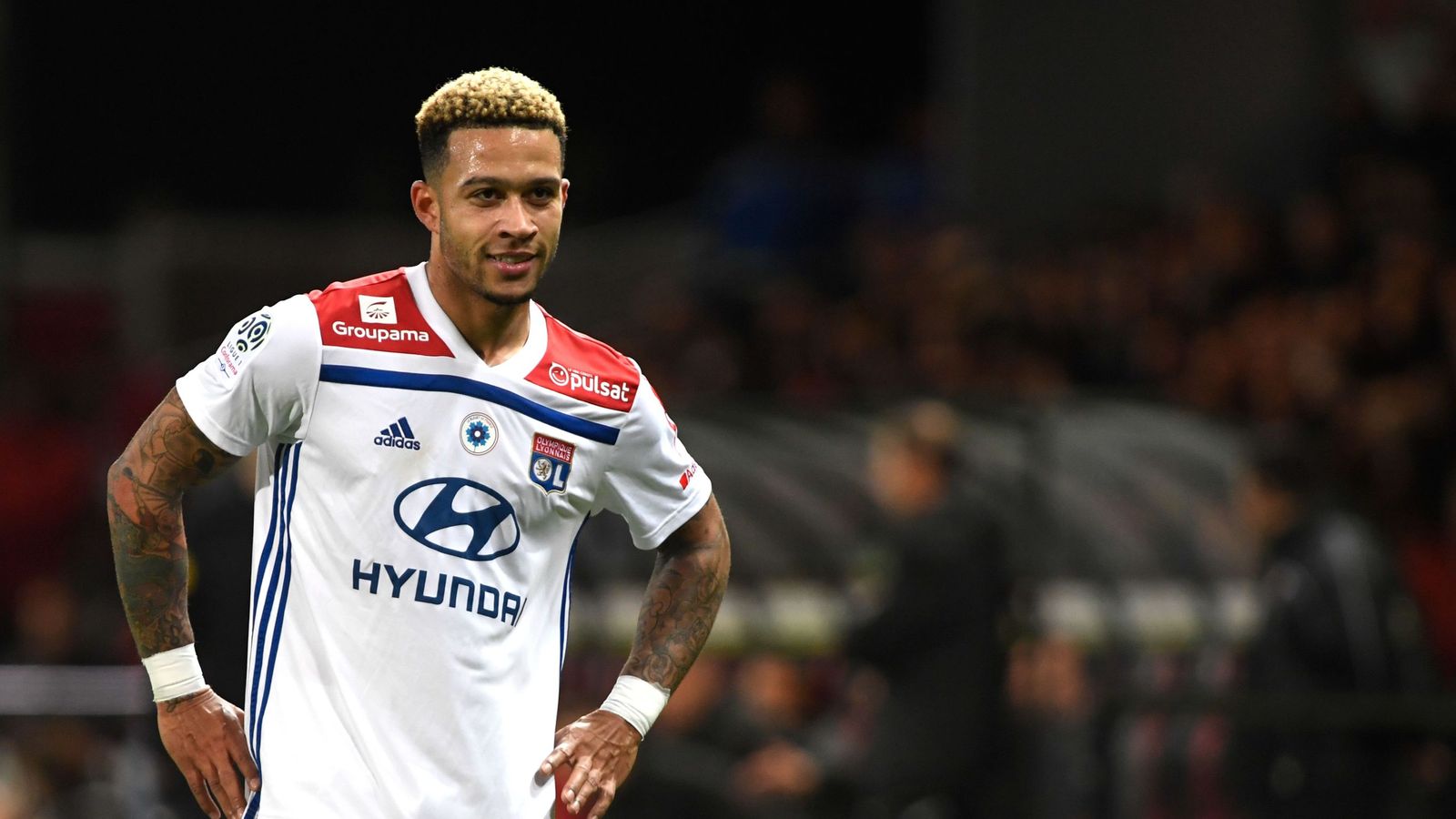 Memphis Depay channels his inner Tiger King as Lyon star poses