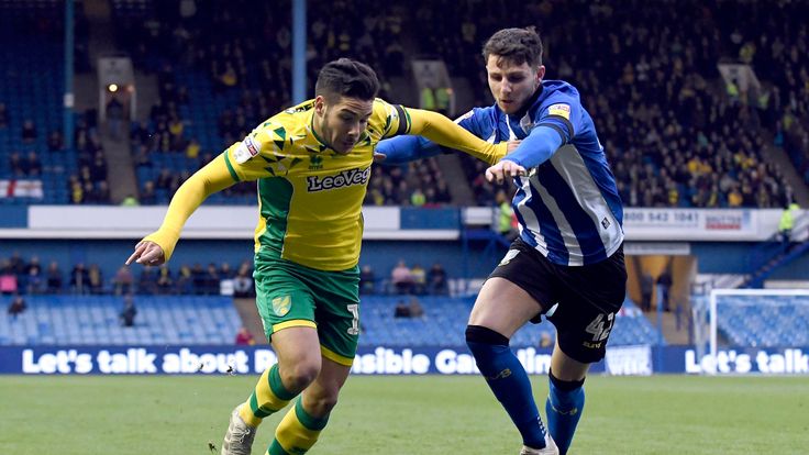 Emiliano Buendía of Norwich City and Matt Penney of Sheffield Wednesday compete for the ball during the Sky Bet Championship match between Sheffield Wednesday and Norwich City at Hillsborough Stadium on November 03, 2018 in Sheffield, England.