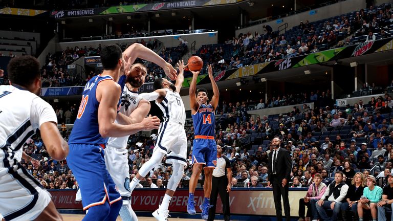 Alonzo Trier launches a shot against Memphis