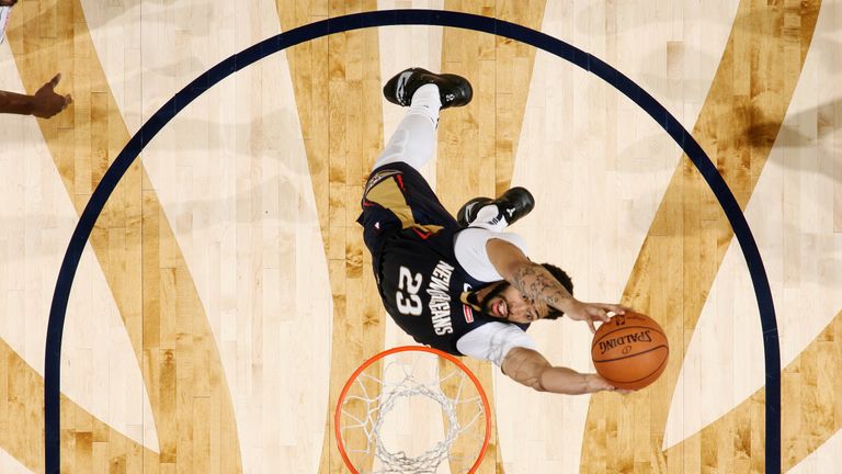 Anthony David throws down a dunk against the New York Knicks