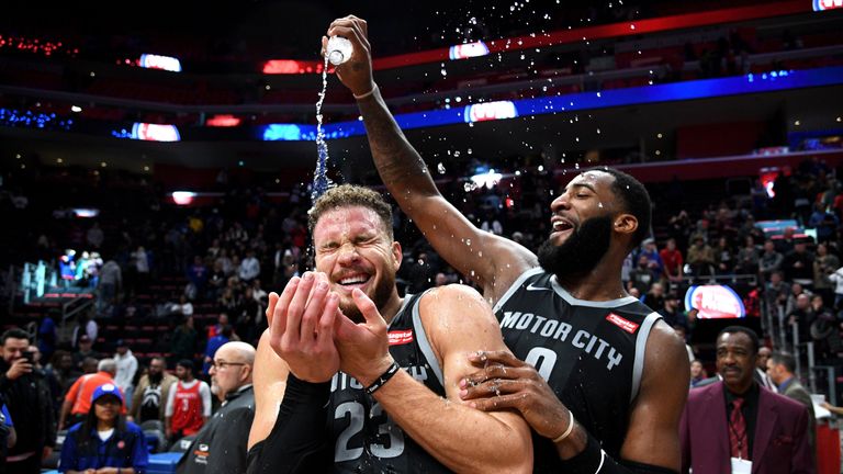 Blake Griffin is drenched by team-mate Andre Drummond after Detroit&#39;s overtime win