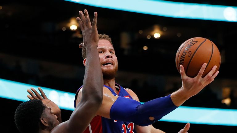 Blake Griffin looks to finish with an up-and-under scoop against the Detroit Pistons
