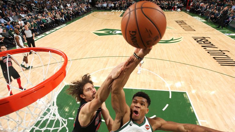 Giannis Antetokounmpo is fouled by Robin Lopez