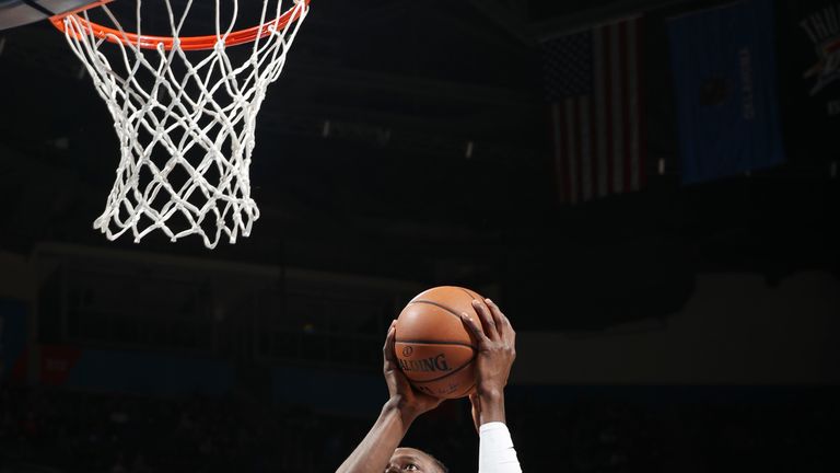 Jerami Grant attacks the rim against the Phoenix Suns