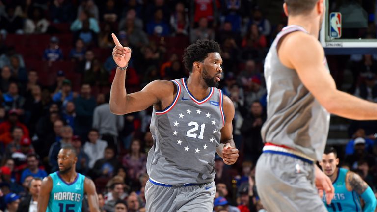 Joel Embiid celebrates during Philadelphia&#39;s overtime win over Charlotte