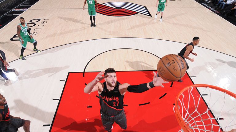 Jusuf Nurkic corrals a rebound for Portland