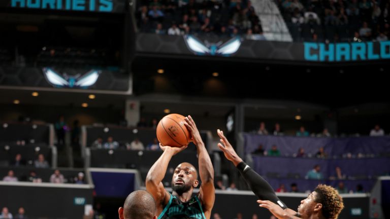 Kemba Walker launches a jumper against Boston
