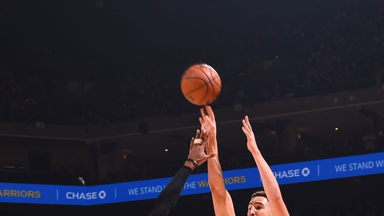 Klay Thompson shoots over Vince Carter