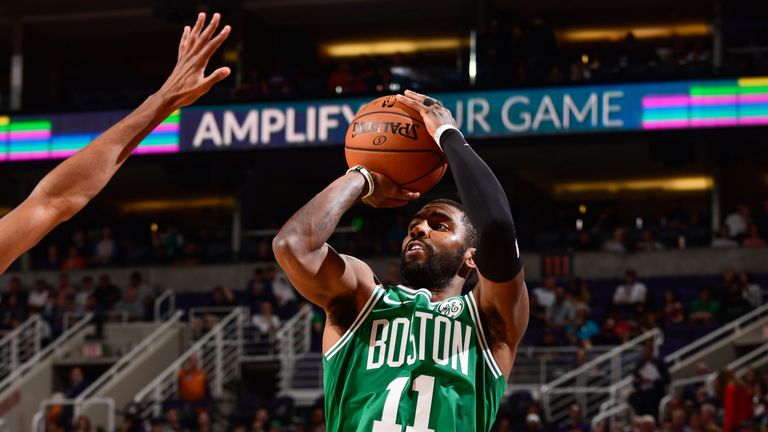 Kyrie Irving fires a jump shot aginst Phoenix