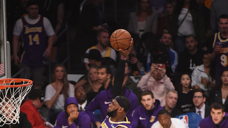 LeBron James dunks on the Minnesota Timberwolves