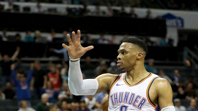 Russell Westbrook celebrates after powering home a dunk