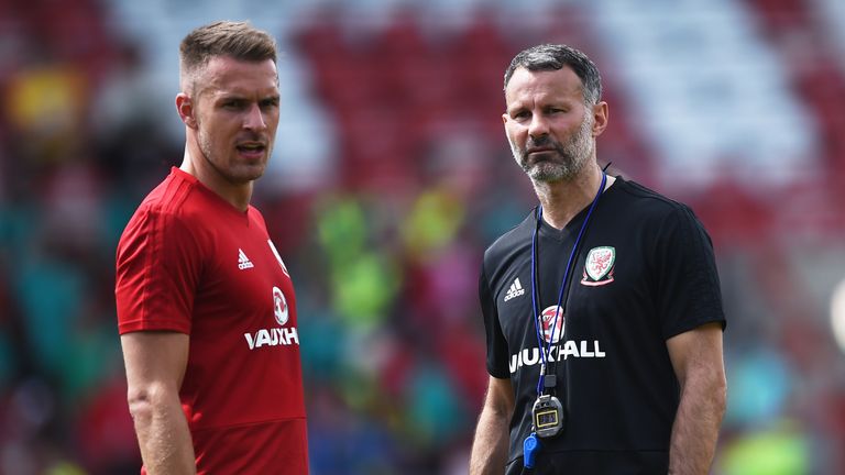 WREXHAM, WALES - MAY 21: Ryan Giggs manager of Wales talks to Aaron Ramsey during a training session a the Racecourse Ground on May 21, 2018 in Wrexham, Wales. (Photo by Nathan Stirk/Getty Images)