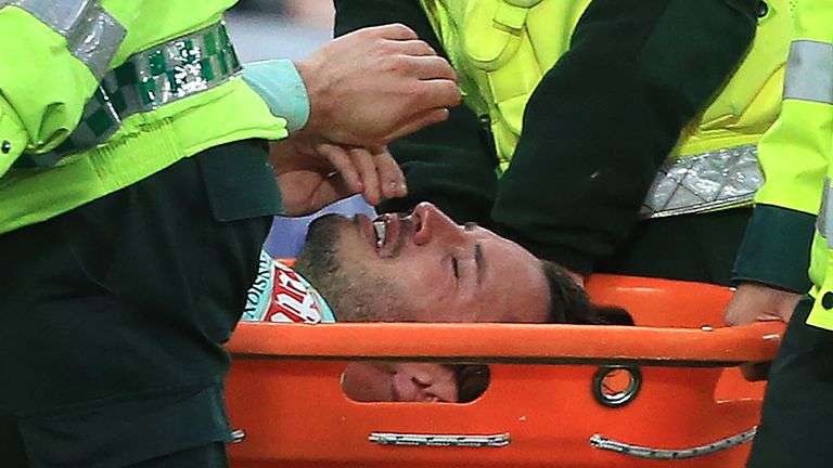 Adam Smith is stretchered off during the Premier League match between Newcastle United and Bournemouth