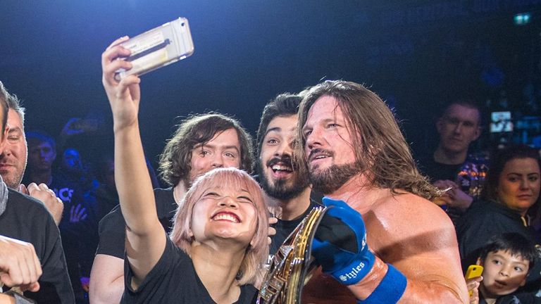 AJ Styles spent a long time after his match meeting fans