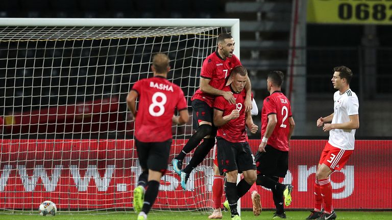 Albania's Bekim Balaj celebrates scoring against Wales