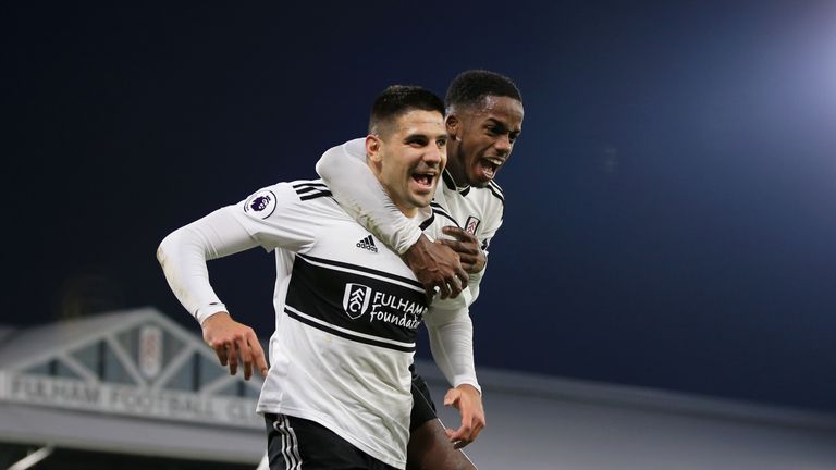 Aleksandar Mitrovic celebrates with team-mate Ryan Sessegnon after Fulham take a 3-2 lead