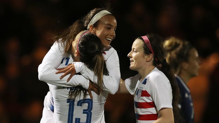 Mallory Pugh of United States congratulates team mate Alex Morgan after she scores the opening goal during the Women's International Friendly match between Scotland and the United States
