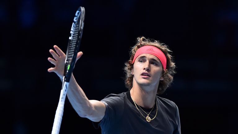 Alexander Zverev throws his racket during a break in play against Croatia's Marin Cilic during their men's singles round-robin match on day two of the ATP World Tour Finals tennis tournament at the O2 Arena in London on November 12, 2018.