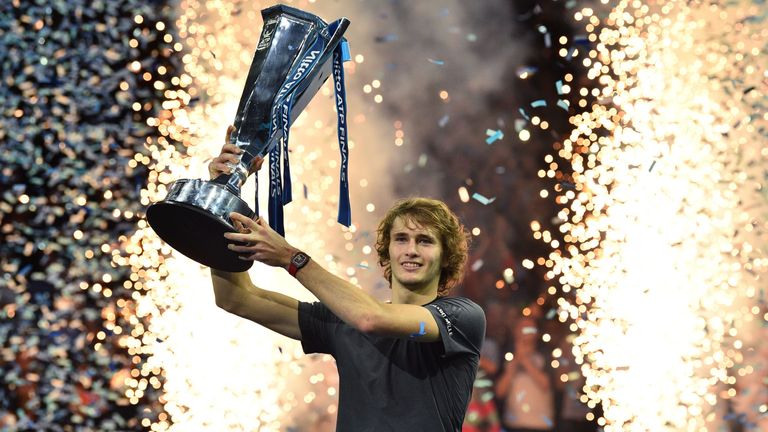 Alexander Zverev holds up the trophy after beating Serbia&#39;s Novak Djokovic in their men&#39;s singles final match on day eight of the ATP World Tour Finals tennis tournament at the O2 Arena in London on November 18, 2018. 