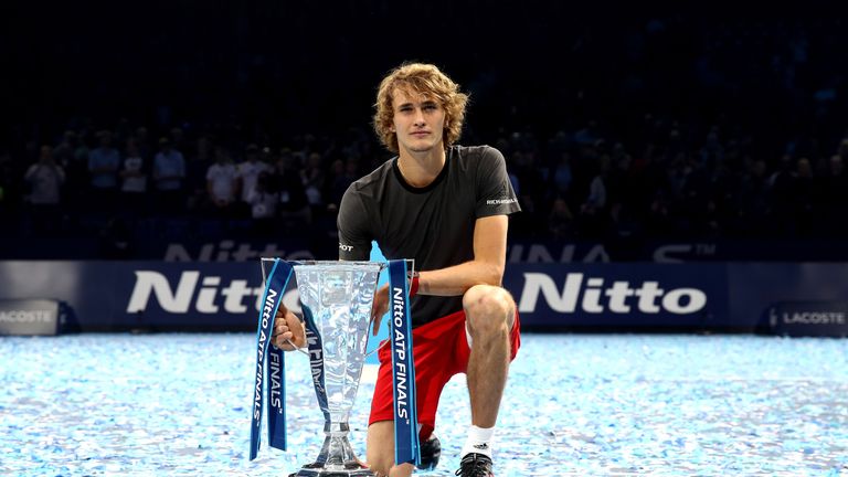 Alexander Zverev of Germany celebrates victory with the trophy following the singles final against Novak Djokovic of Serbia during Day Eight of the Nitto ATP Finals at The O2 Arena on November 18, 2018 in London, England. 