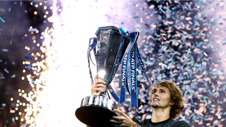 Alexander Zverev of Germany celebrates with the trophy following the singles final against Novak Djokovic of Serbia during Day Eight of the Nitto ATP Finals at The O2 Arena on November 18, 2018 in London, England.