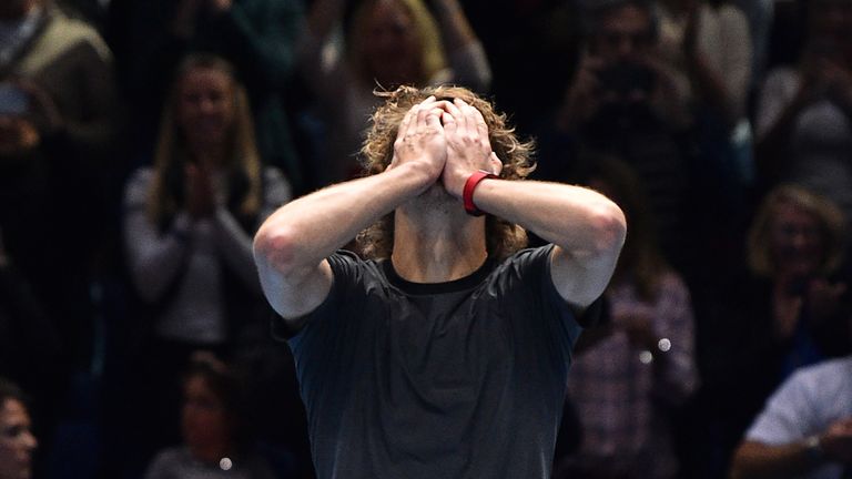 Alexander Zverev celebrates after beating Serbia's Novak Djokovic in their men's singles final match on day eight of the ATP World Tour Finals tennis tournament at the O2 Arena in London on November 18, 2018