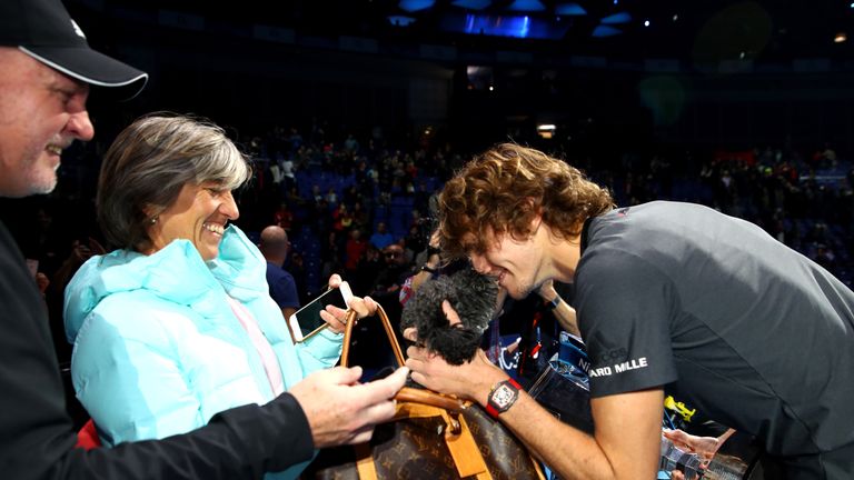 Alexander Zverev of Germany celebrates with his mum, Irina Zvereva and the family dog following the singles final against Novak Djokovic of Serbia during Day Eight of the Nitto ATP Finals at The O2 Arena on November 18, 2018 in London, England