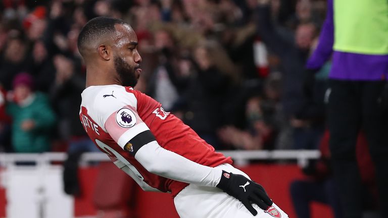 Alexandre Lacazette celebrates Arsenal's equaliser against Liverpool