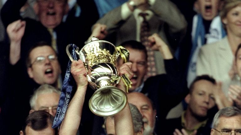 Andy Morrison lifts a trophy at Wembley, fulfilling a lifelong dream