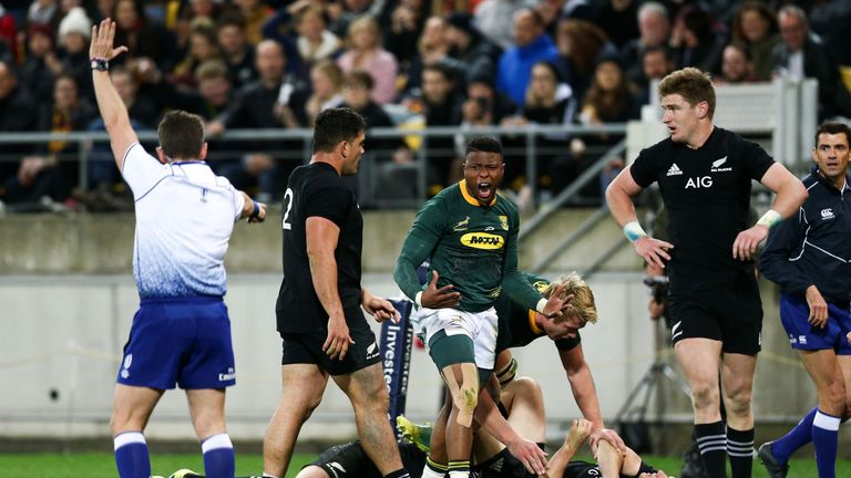 Aphiwe Dyantyi celebrates scoring a try during The Rugby Championship match between the New Zealand All Blacks and the South Africa Springboks at Westpac Stadium on September 15, 2018 in Wellington, New Zealand.