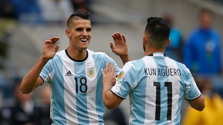 Erik Lamela celebrates scoring for Argentina with team-mate Sergio Aguero