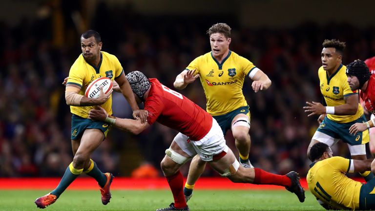 Kurtley Beale of Australia is tackled by Dan Lydiate of Wales during the International Friendly match between Wales and Australia at Principality Stadium on November 10, 2018 in Cardiff, United Kingdom.