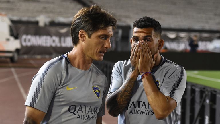 Carlos Tevez and Boca Juniors coach Guillermo Barros Schelotto