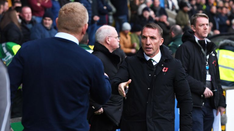 Celtic manager Brendan Rodgers shakes hands with Livingston boss Gary Holt before kick-off