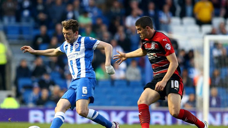 Brighton's Dale Stephens and Huddersfield's Conor Coady in action in the Championship in 2015