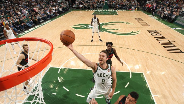 Matthew Dellavedova #8 of the Milwaukee Bucks shoots the ball against the Portland Trail Blazers on November 21, 2018 at Fiserv Forum in Milwaukee, Wisconsin.