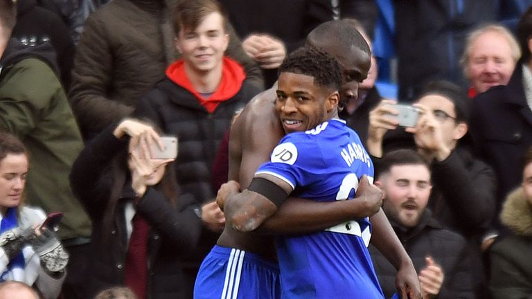 Cardiff City's Sol Bamba (left) celebrates scoring his side's second goal against Brighton with Kadeem Harris 