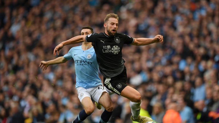  Charlie Taylor of Burnley is fouled by Phil Foden of Manchester City during the Premier League match between Manchester City and Burnley FC at Etihad Stadium on October 20, 2018 in Manchester, United Kingdom. 