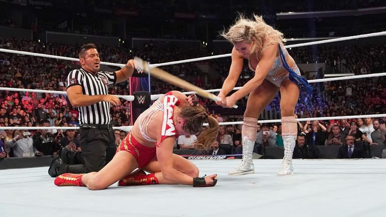 Charlotte Flair inflicted a vicious assault on Ronda Rousey after their match at Survivor Series