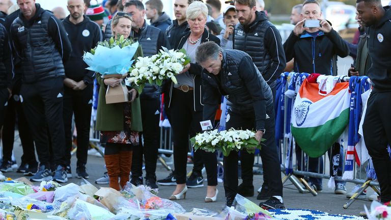 Leicester City manager Claude Puel lays a wreath to former chairman Vichai Srivaddhanaprabha outside the King Power Stadium